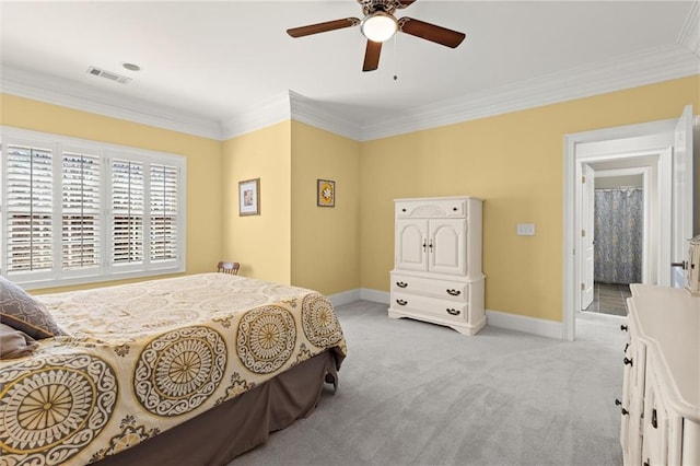 bedroom featuring ceiling fan, light colored carpet, visible vents, baseboards, and crown molding