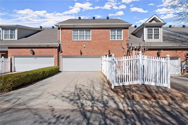 view of front of home featuring fence, concrete driveway, and brick siding