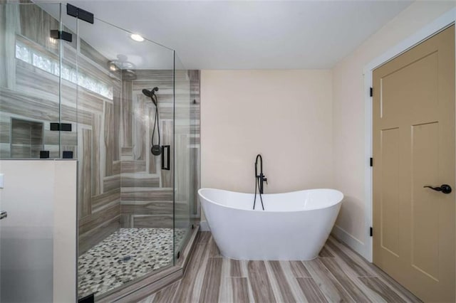 bathroom with independent shower and bath