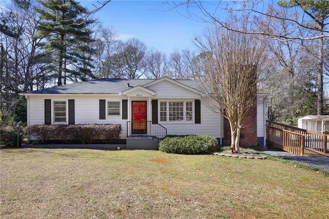 view of front of home with a front yard