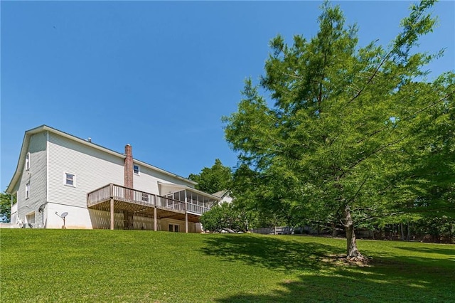 view of yard featuring a wooden deck