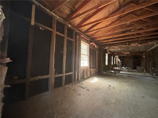 misc room with lofted ceiling