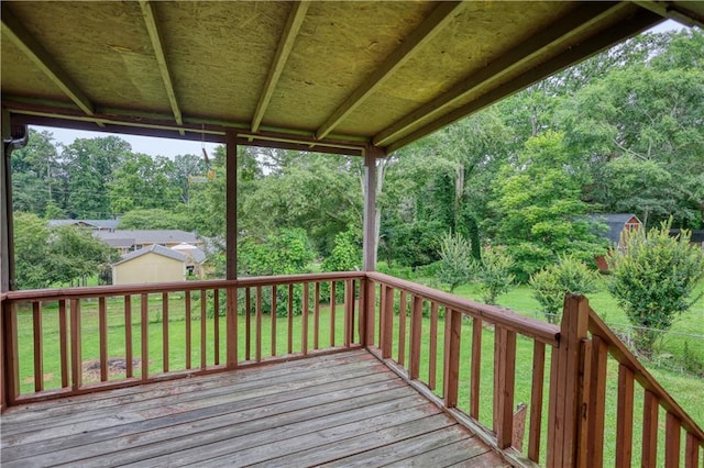 1342 Peggy Ln NW, Conyers, GA 30012 - wooden deck with a storage unit and a lawn