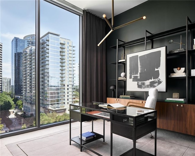 office area featuring light tile patterned flooring and floor to ceiling windows