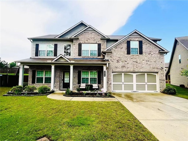 2579 Wimberley Pine Ct, Dacula, GA 30019 - craftsman-style home featuring an attached garage, brick siding, concrete driveway, and a front lawn