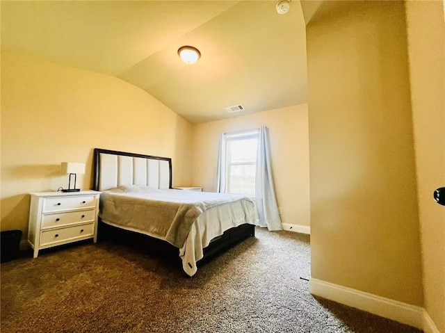 2579 Wimberley Pine Ct, Dacula, GA 30019 - bedroom with lofted ceiling, dark carpet, and baseboards