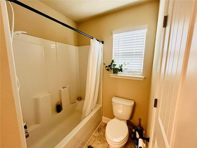 2579 Wimberley Pine Ct, Dacula, GA 30019 - full bathroom with toilet, tile patterned floors, shower / bath combo, and baseboards