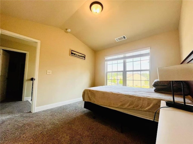 2579 Wimberley Pine Ct, Dacula, GA 30019 - carpeted bedroom with lofted ceiling and baseboards
