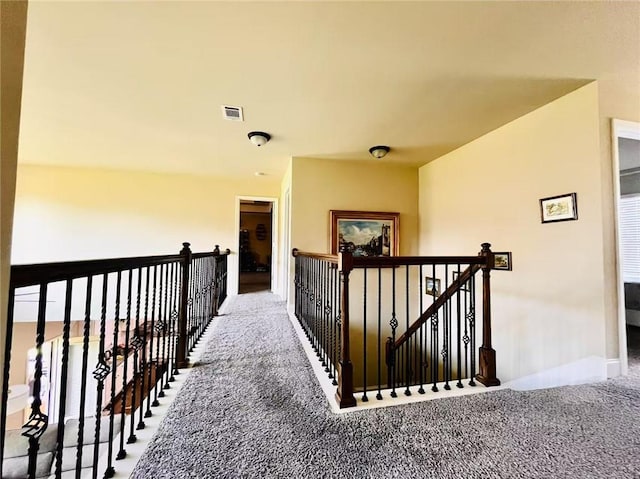 2579 Wimberley Pine Ct, Dacula, GA 30019 - hallway featuring carpet flooring, an upstairs landing, and baseboards