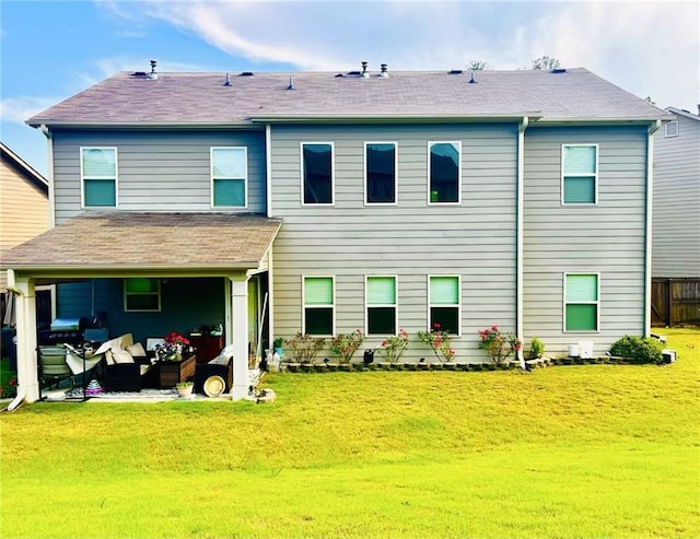 2579 Wimberley Pine Ct, Dacula, GA 30019 - back of property featuring a lawn, outdoor lounge area, and a patio