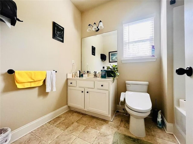 2579 Wimberley Pine Ct, Dacula, GA 30019 - bathroom featuring toilet, baseboards, and vanity