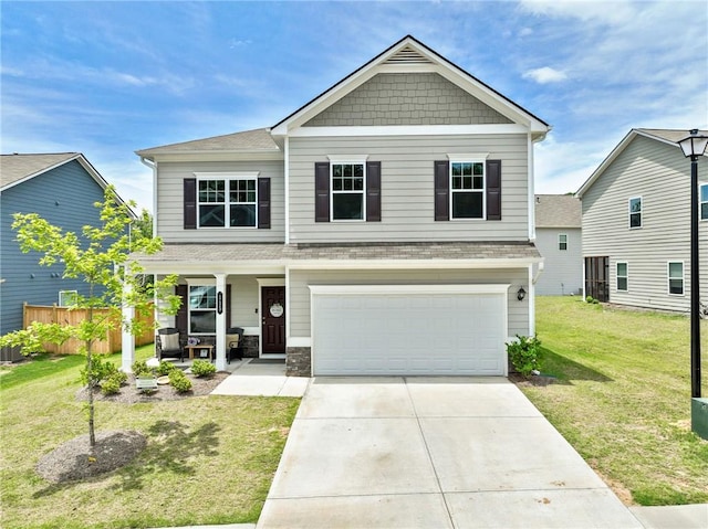 115 Copeland Bnd, Jasper, GA 30143 - craftsman inspired home featuring covered porch, roof with shingles, a front lawn, concrete driveway, and a garage