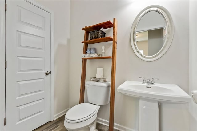 115 Copeland Bnd, Jasper, GA 30143 - half bathroom with toilet, wood finished floors, and baseboards