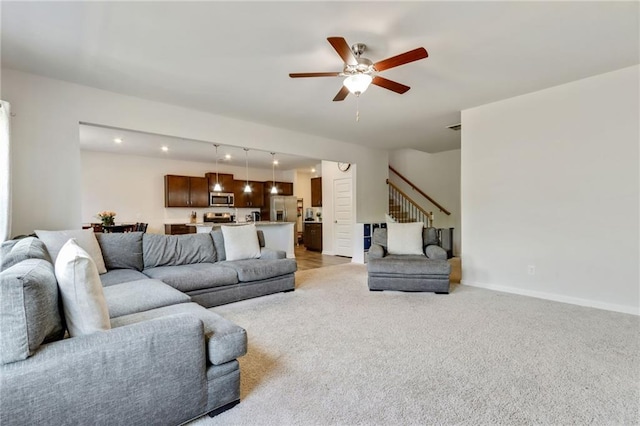 115 Copeland Bnd, Jasper, GA 30143 - living area with light carpet, stairs, ceiling fan, and baseboards