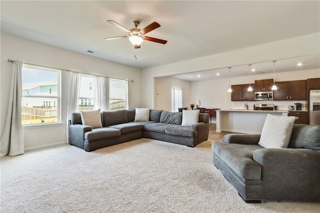 115 Copeland Bnd, Jasper, GA 30143 - living room with light colored carpet, baseboards, and a ceiling fan