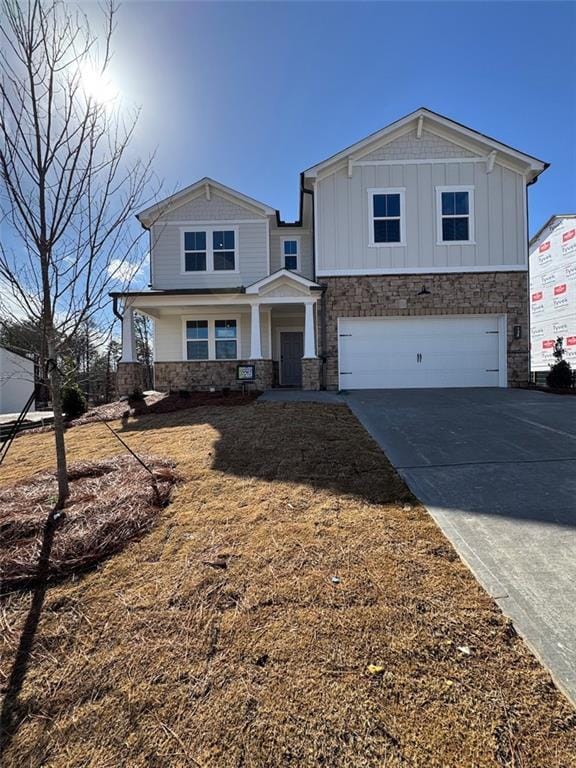 view of front of home with a garage