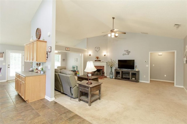175 Prince Ct, Hiram, GA 30141 - living area with ceiling fan, baseboards, high vaulted ceiling, and a fireplace