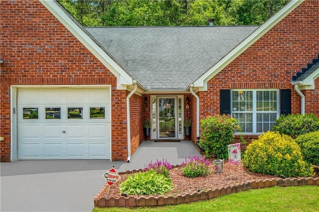 175 Prince Ct, Hiram, GA 30141 - view of front facade featuring brick siding, an attached garage, roof with shingles, and driveway