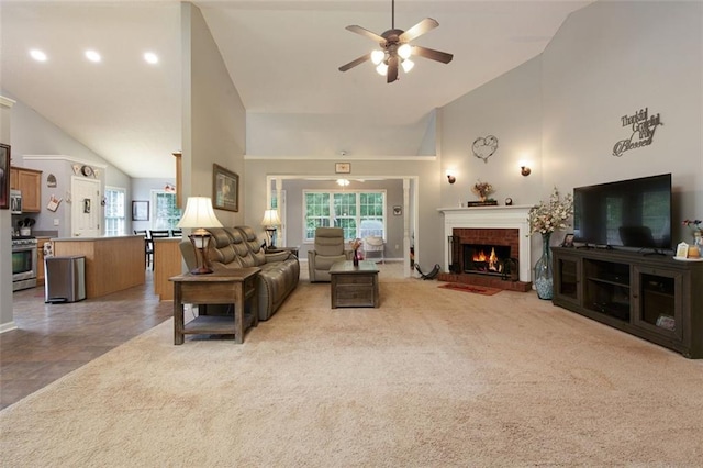 175 Prince Ct, Hiram, GA 30141 - living area featuring ceiling fan, a brick fireplace, and high vaulted ceiling