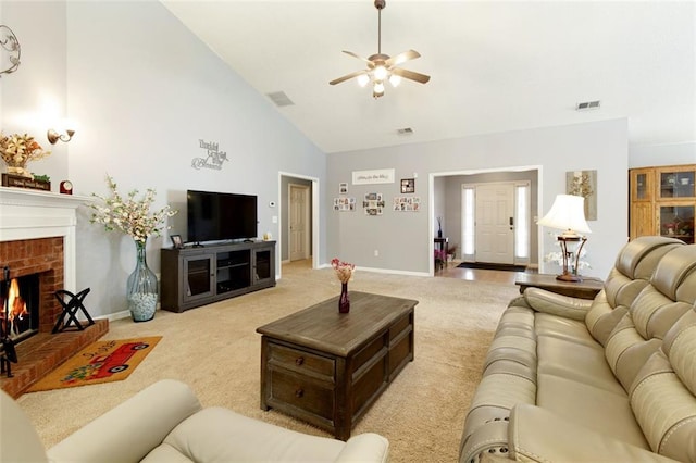 175 Prince Ct, Hiram, GA 30141 - living area featuring carpet, a ceiling fan, high vaulted ceiling, baseboards, and a brick fireplace