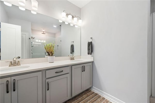 bathroom with vanity and an enclosed shower