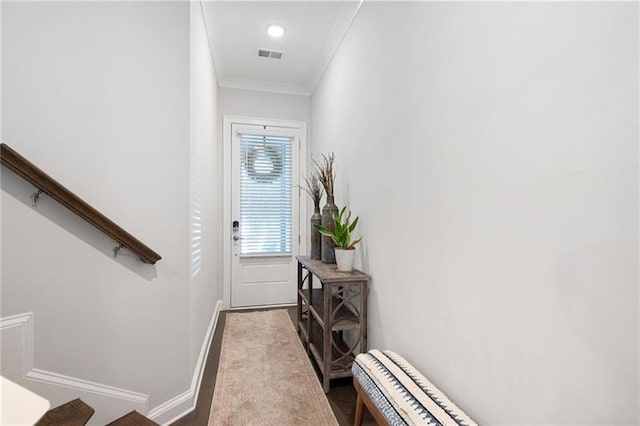 entryway with crown molding