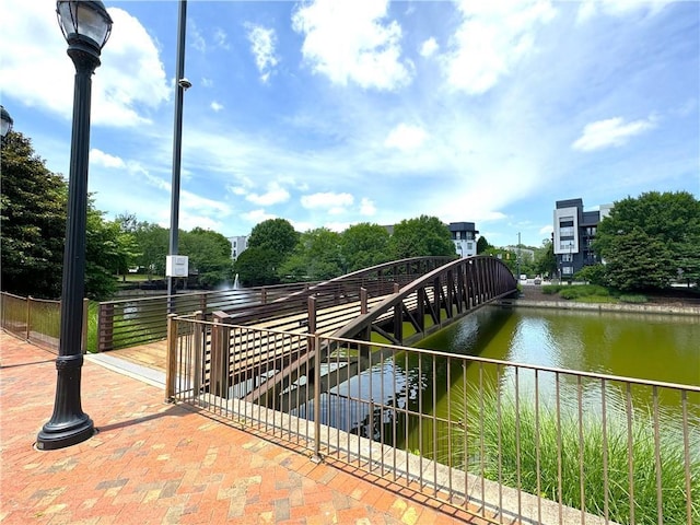 view of home's community with a water view