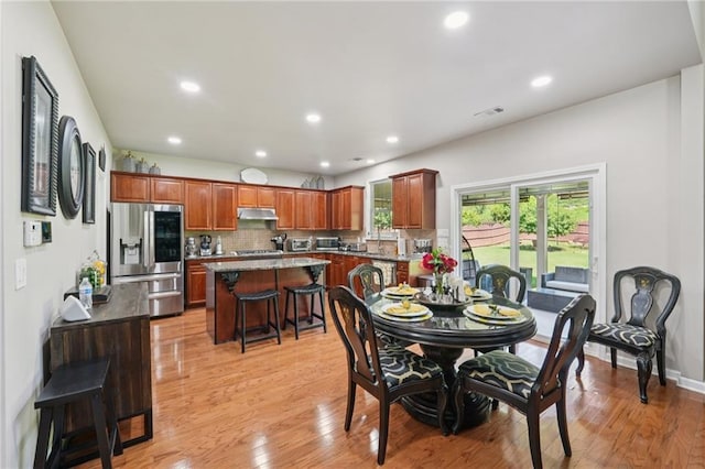 852 Van Briggle Path, Sugar Hill, GA 30518 - dining room featuring light wood-type flooring and recessed lighting