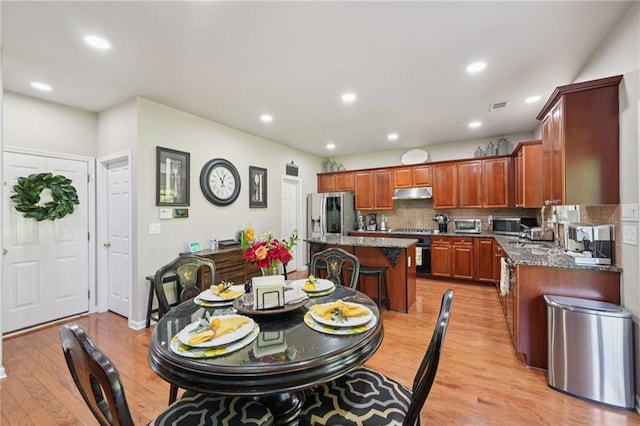 852 Van Briggle Path, Sugar Hill, GA 30518 - dining space with light wood finished floors and recessed lighting