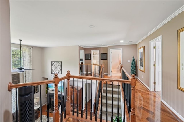 852 Van Briggle Path, Sugar Hill, GA 30518 - hallway featuring an upstairs landing, wood finished floors, ornamental molding, and recessed lighting