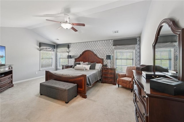 852 Van Briggle Path, Sugar Hill, GA 30518 - bedroom with an accent wall, vaulted ceiling, light colored carpet, a ceiling fan, and wallpapered walls