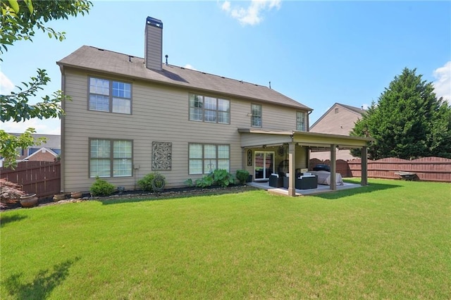 852 Van Briggle Path, Sugar Hill, GA 30518 - rear view of property with a patio area, a fenced backyard, a chimney, and an outdoor living space