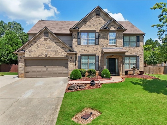 852 Van Briggle Path, Sugar Hill, GA 30518 - view of front of home with brick siding, concrete driveway, and a garage