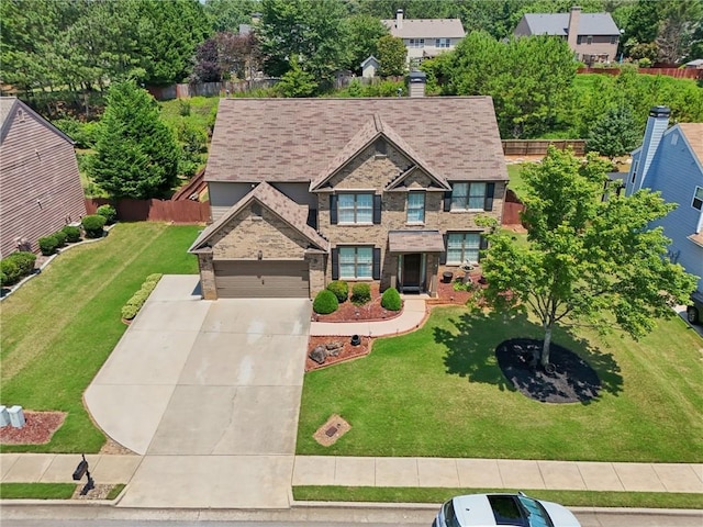852 Van Briggle Path, Sugar Hill, GA 30518 - view of front of house featuring driveway and brick siding
