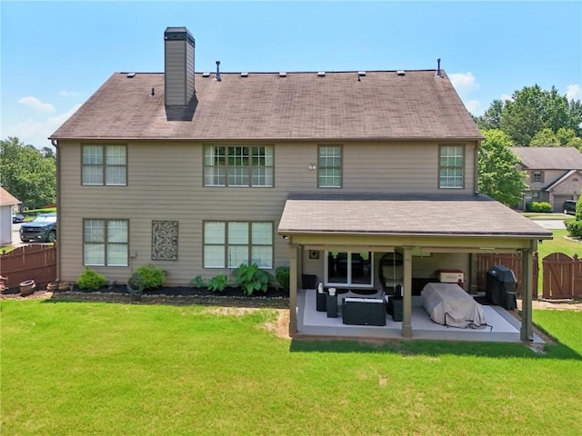 852 Van Briggle Path, Sugar Hill, GA 30518 - rear view of house featuring a patio and a chimney