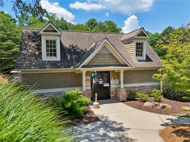 852 Van Briggle Path, Sugar Hill, GA 30518 - view of front facade with stone siding and a shingled roof