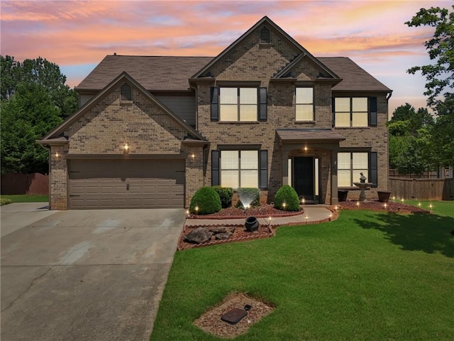 852 Van Briggle Path, Sugar Hill, GA 30518 - view of front of property featuring driveway, brick siding, and a garage
