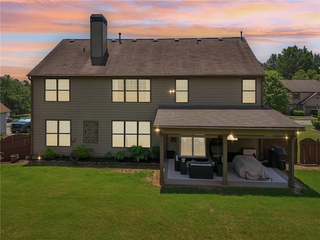 852 Van Briggle Path, Sugar Hill, GA 30518 - back of property with a patio, a chimney, and roof with shingles