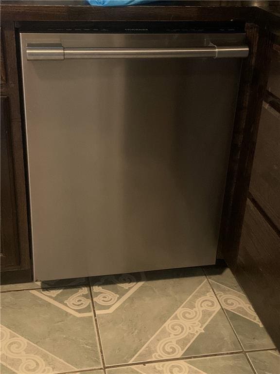 details featuring dishwasher and dark brown cabinetry