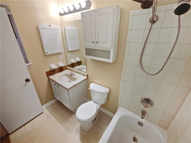 full bathroom featuring vanity, toilet, and tiled shower / bath combo