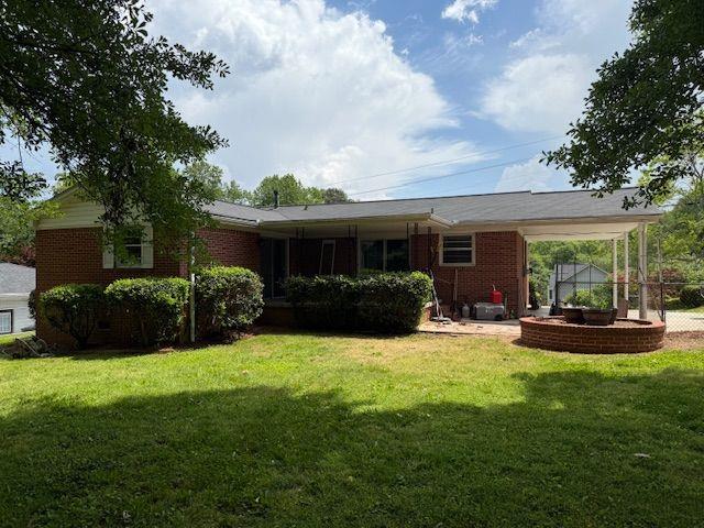 2190 Olive Springs Rd SE, Marietta, GA 30060 - back of house with brick siding