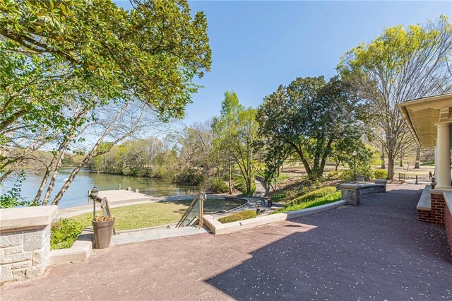 view of property's community featuring a water view