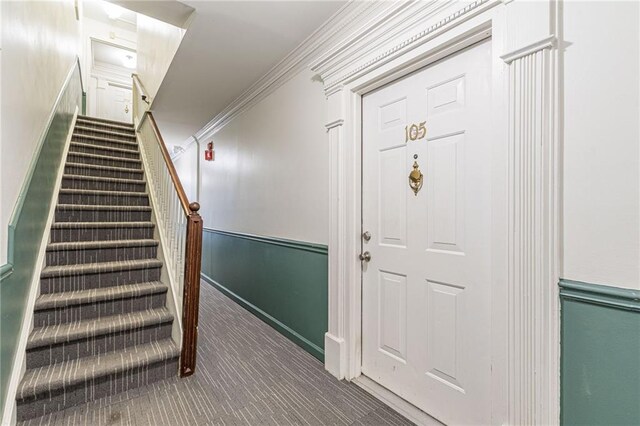 staircase with crown molding