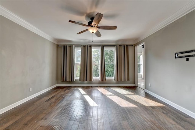 4770 Spring Park Cir, Suwanee, GA 30024 - spare room with a ceiling fan, dark wood finished floors, and ornamental molding