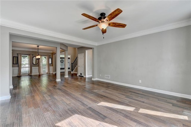 4770 Spring Park Cir, Suwanee, GA 30024 - unfurnished living room with dark wood-type flooring, stairway, crown molding, and ceiling fan