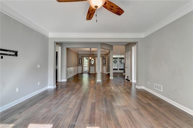 4770 Spring Park Cir, Suwanee, GA 30024 - unfurnished living room with crown molding, dark wood finished floors, ceiling fan, and a chandelier