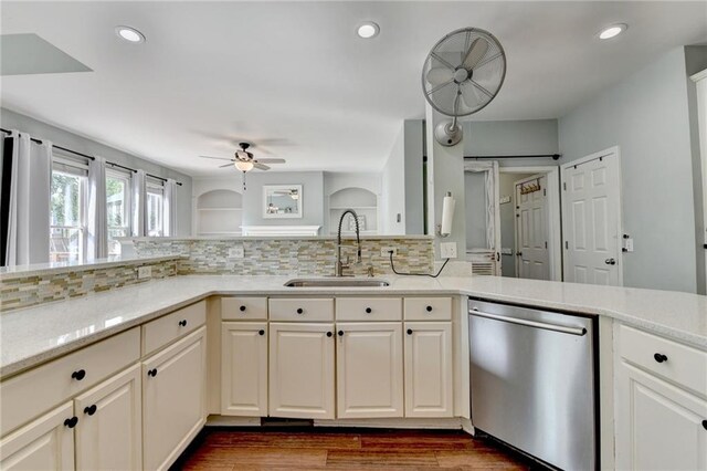 4770 Spring Park Cir, Suwanee, GA 30024 - kitchen with stainless steel dishwasher, a ceiling fan, tasteful backsplash, dark wood finished floors, and recessed lighting