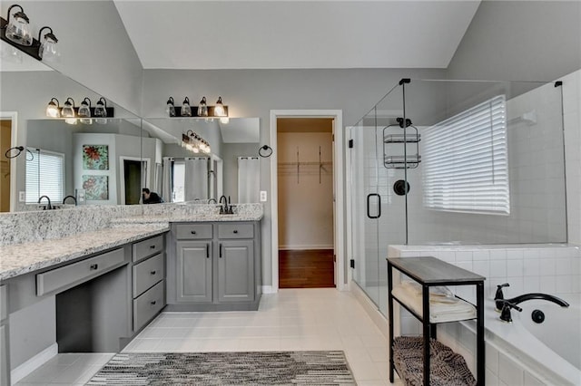 4770 Spring Park Cir, Suwanee, GA 30024 - full bathroom featuring a stall shower, vanity, a garden tub, and a walk in closet