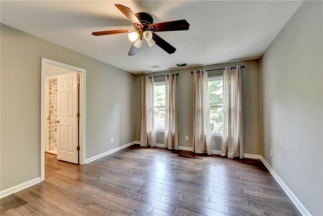 4770 Spring Park Cir, Suwanee, GA 30024 - empty room with ceiling fan and wood finished floors