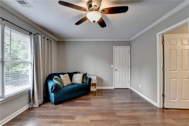 4770 Spring Park Cir, Suwanee, GA 30024 - sitting room featuring a ceiling fan, ornamental molding, and wood finished floors